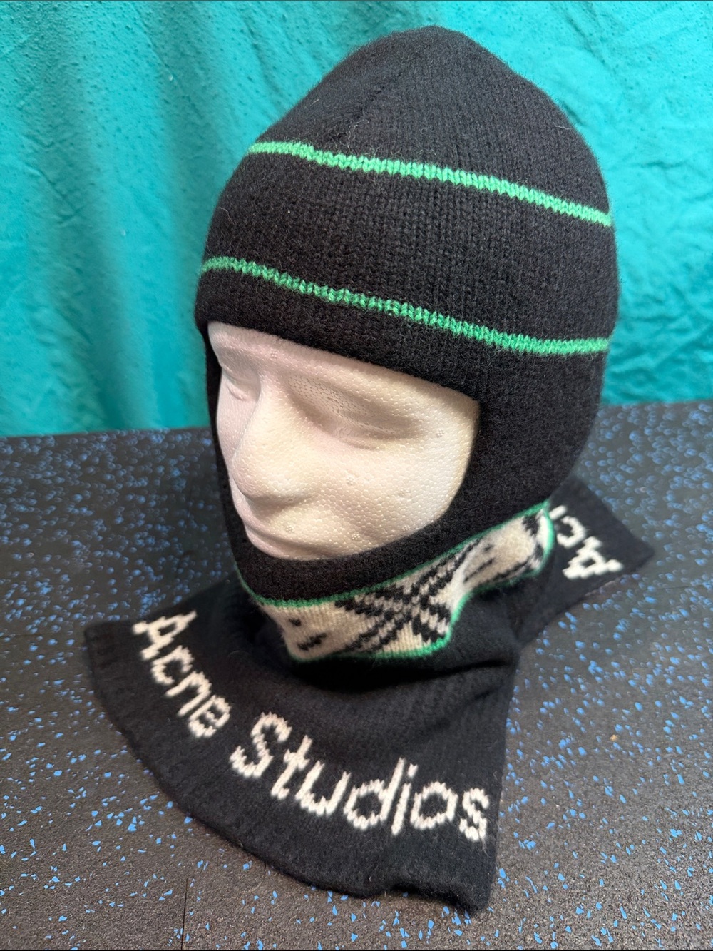 Acne black knit balaclava with green stripes